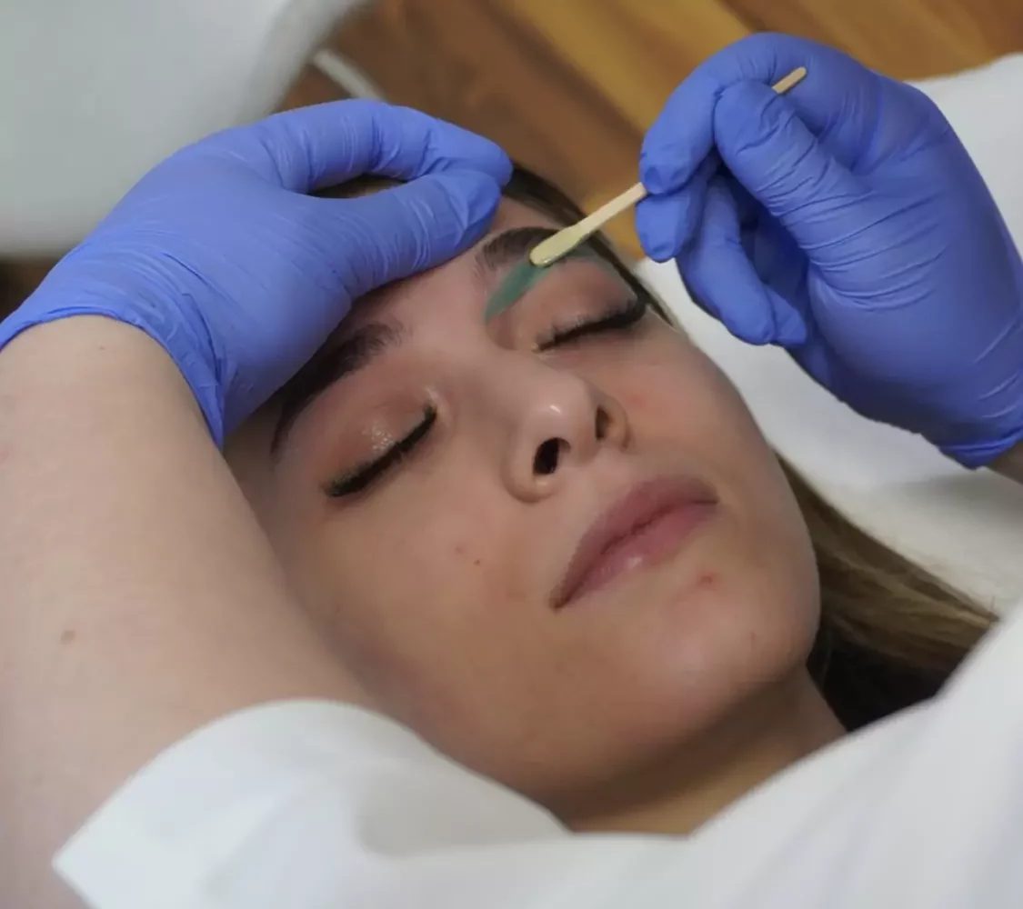 Mari completing an eyebrow wax in Bourbonnais